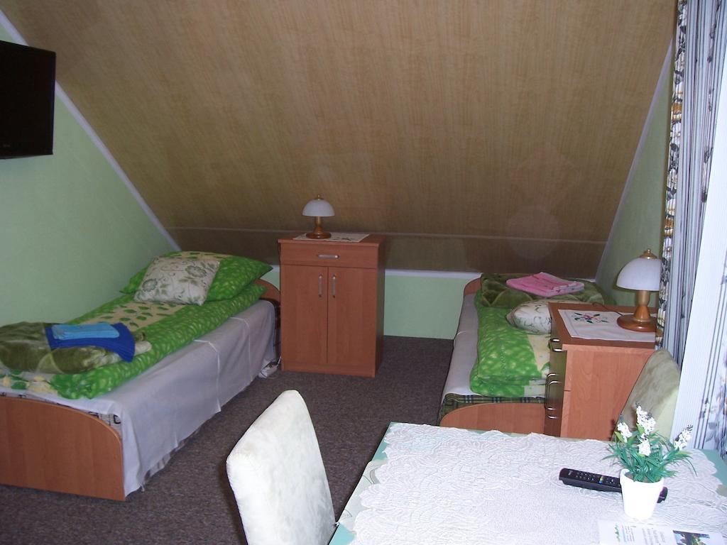 Gosciniec Nad Stawem Villa Szczytno  Rum bild